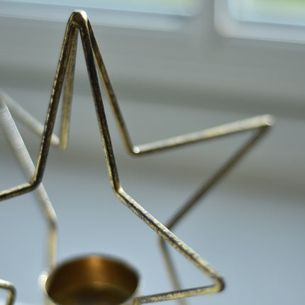 Single Star gold metal tea light holder